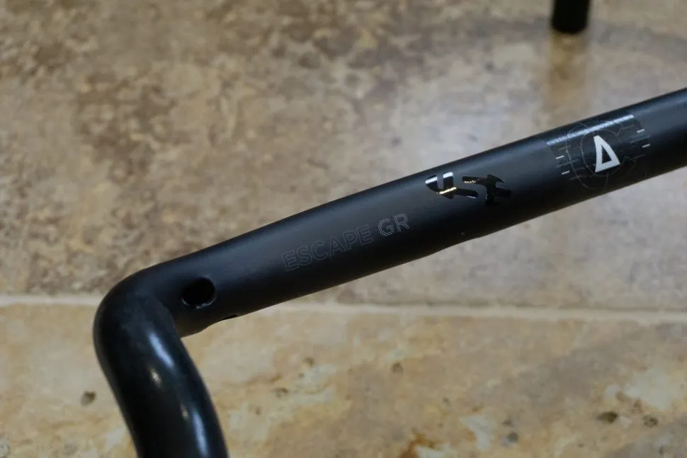 Black bicycle handlebars, stem and seatpost